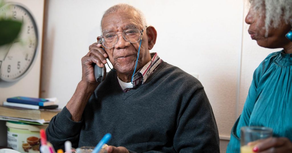 photo of a senior man on a phone