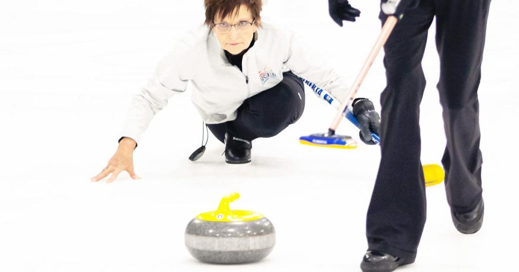 Nanette Dupont throwing the curling stone and the October 2022 Helena Bonspiel