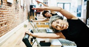 photo of elder women in a gym, working on healthy habits