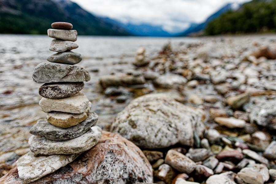 Stacked rocks along the shore